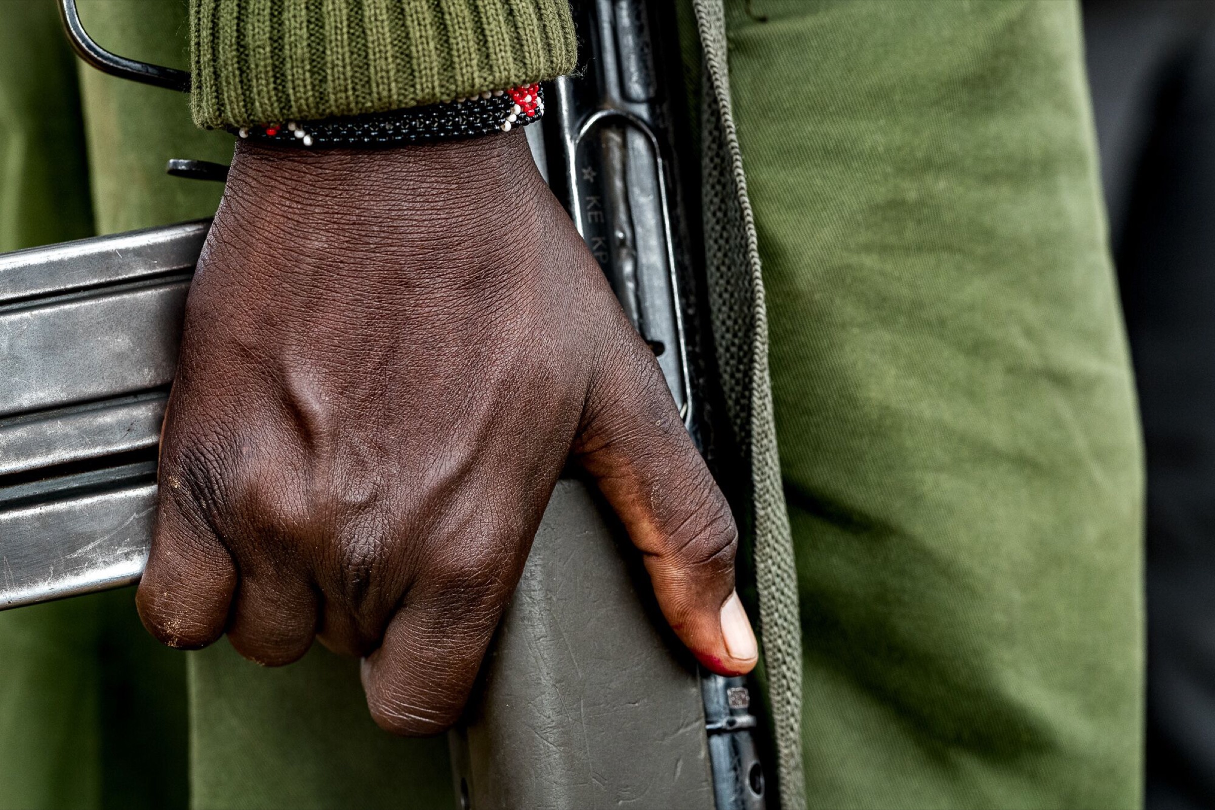 A Naibunga Conservancy ranger holds his rifle at his side—a reminder of the persistent threat posed by elephant poachers in the region, as well as by elephants roaming into human settlements.
