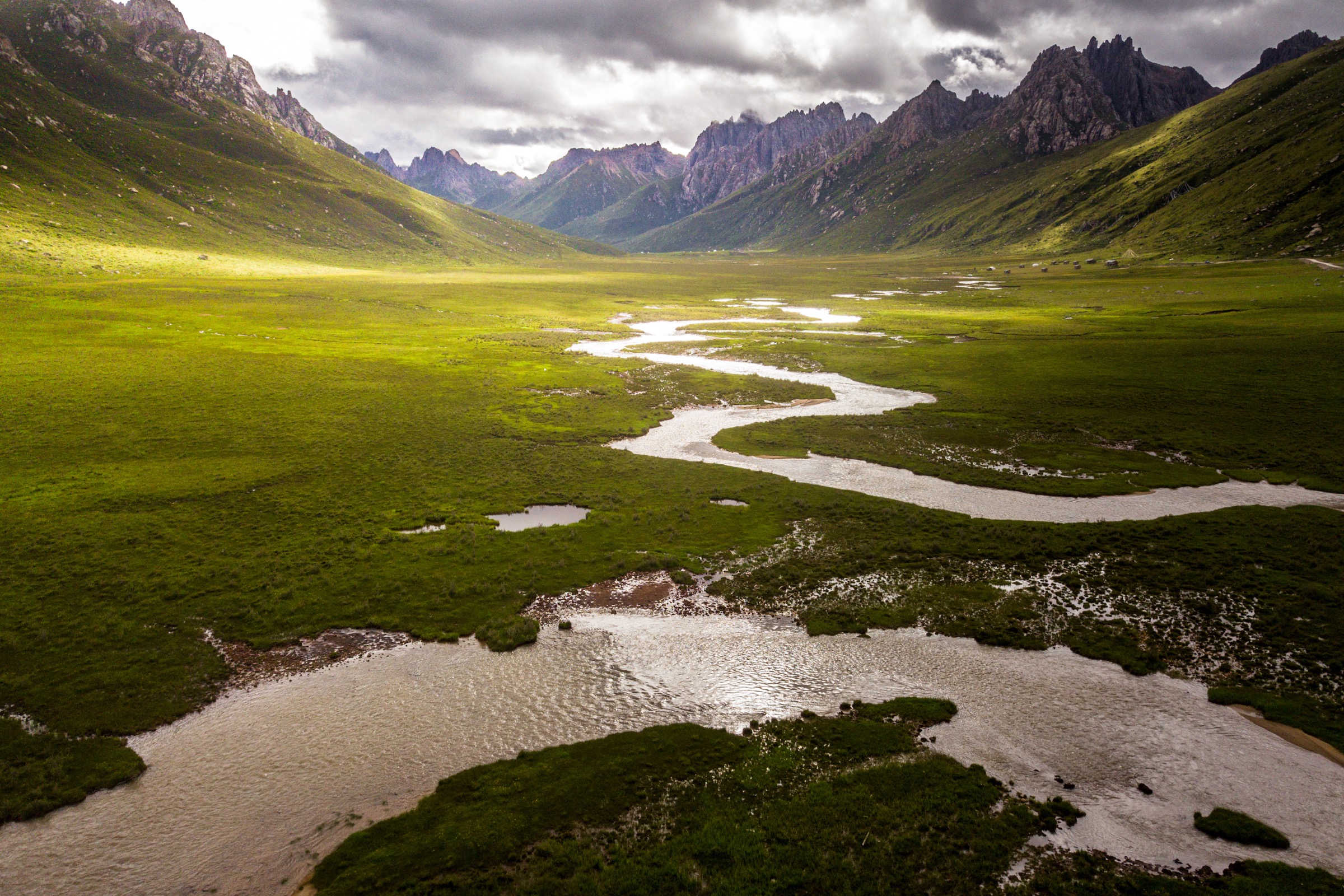 The Nyenpo Yurtse Mountain massif in the southeastern corner of Sanjiangyuan National Park is one of the most stunning landscapes in the park, but was recently closed due to environmental damage caused by tourists. Photograph by Kyle Obermann