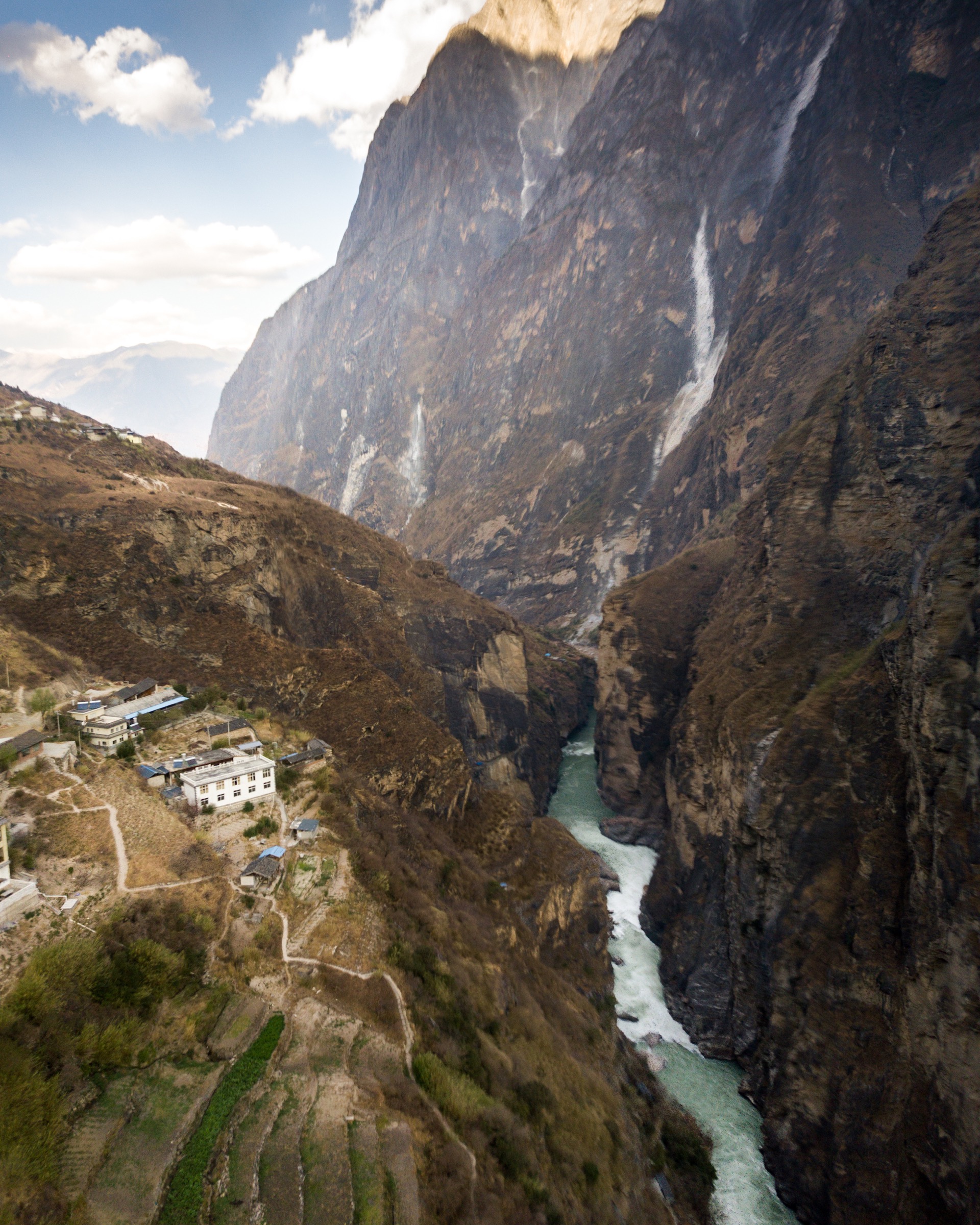 Before the Yangtze runs out into the more densely populated eastern China, it cuts through countless dramatic mountains landscapes. Photograph by Kyle Obermann