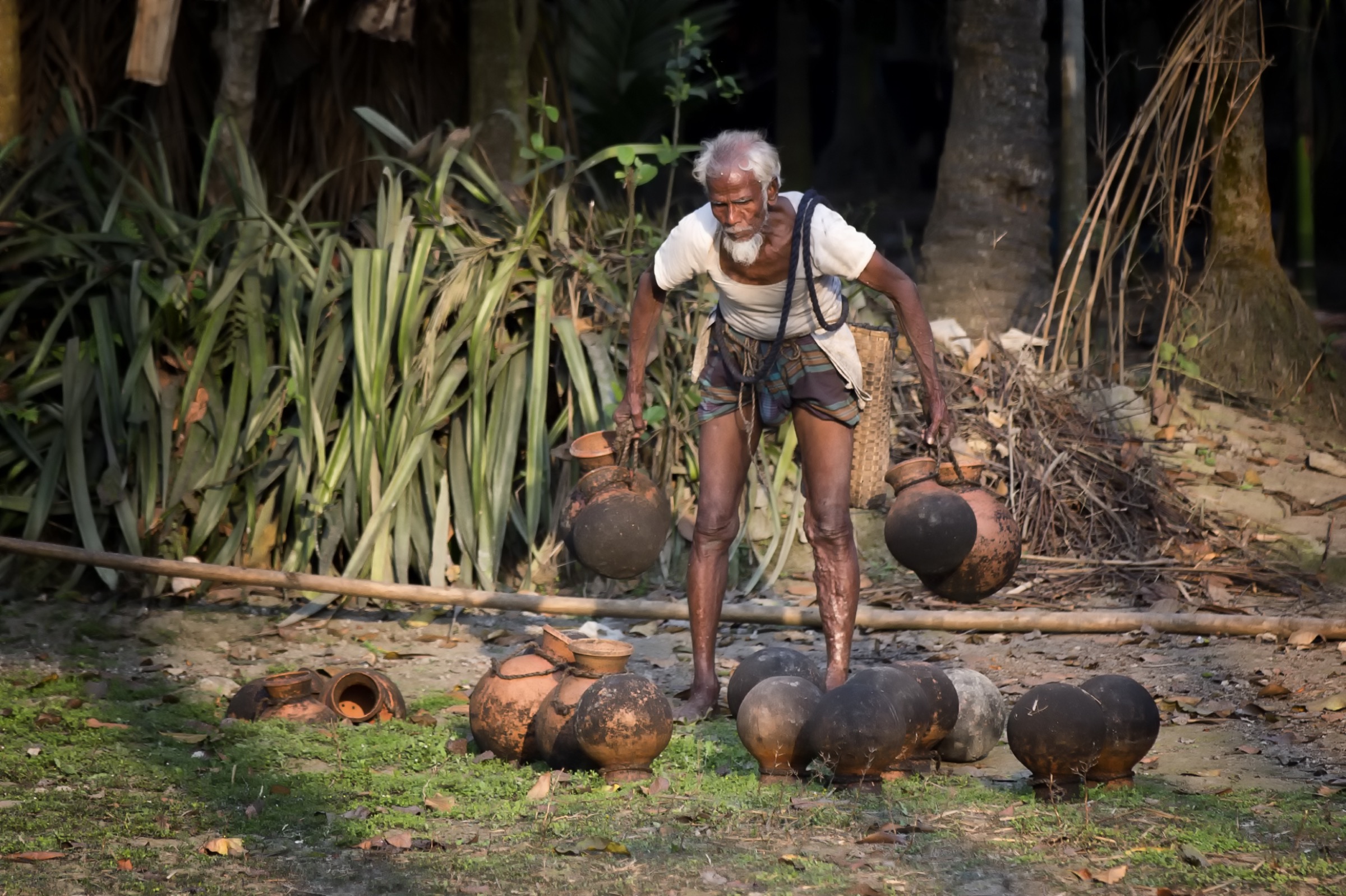 This man says he has been tapping date palm trees near his home for more than 50 years, since before Bangladesh’s 1971 War of Independence.