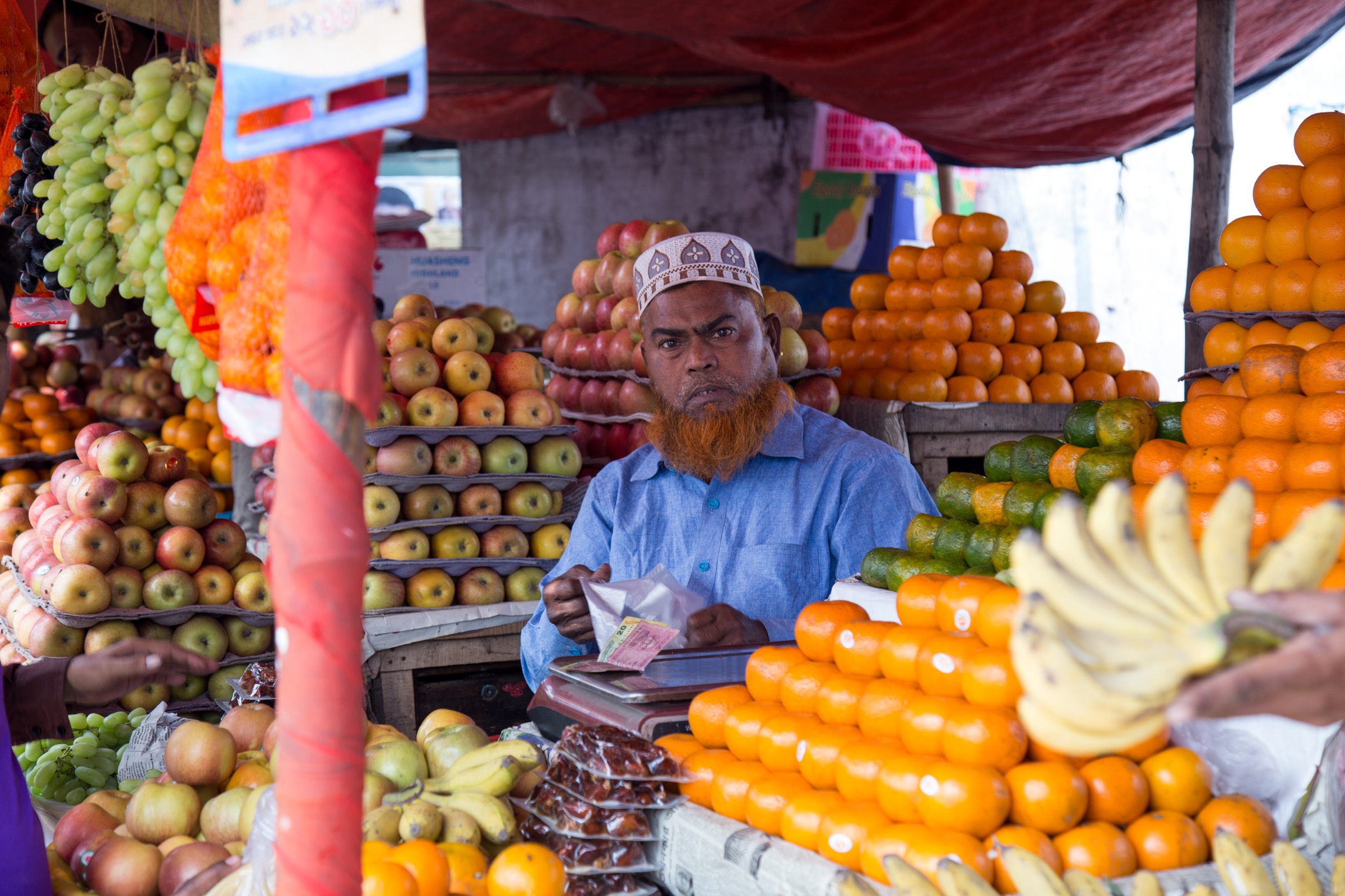 For a city most people have never heard of, northern Bangladesh’s Rangpur City is a bustling place that wakes up early each morning to offer fresh fruit, mobile phones, and just about anything else you could desire. Photograph by Steven Bedard