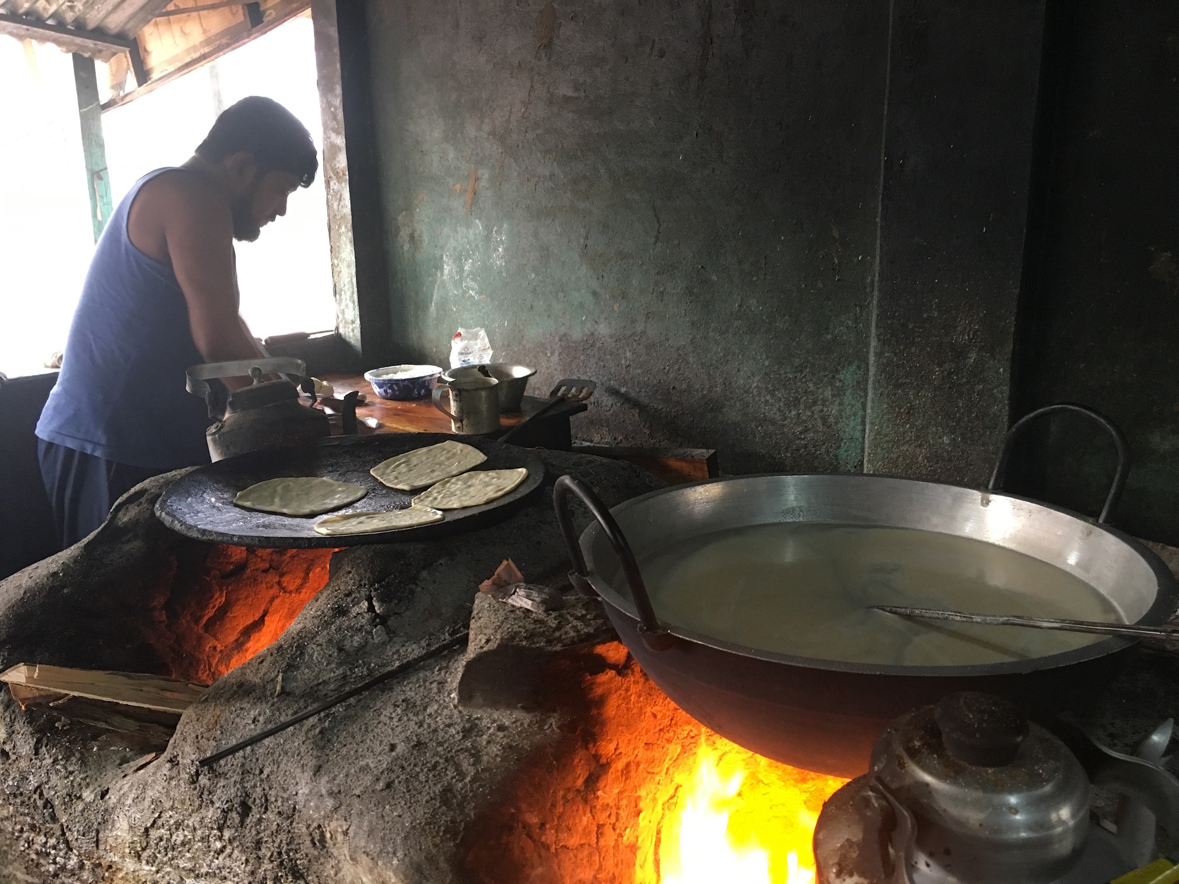 It’s not hard to find a meal in Rangpur city. Nearly everywhere you look, vendors are cooking traditional meals over wood fires and propane stoves. Photograph by Steven Bedard