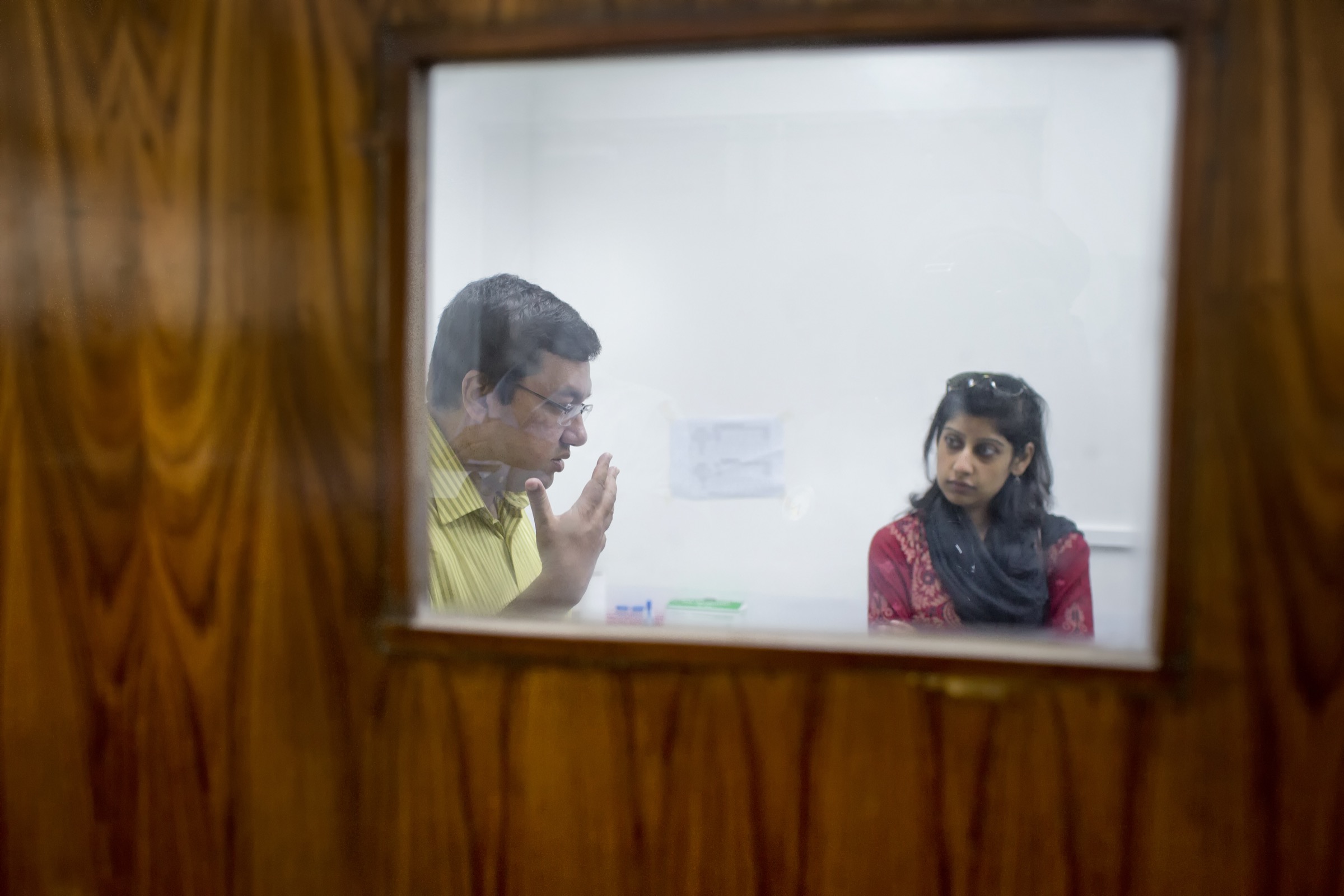 ICDDR,B’s Hossain M. S. Sazzad and Farasha Bashir discuss one of the organization’s initiatives, which aims to better understand the root causes of Bangladesh’s high mortality rate among children. Photograph by A.M. Ahad