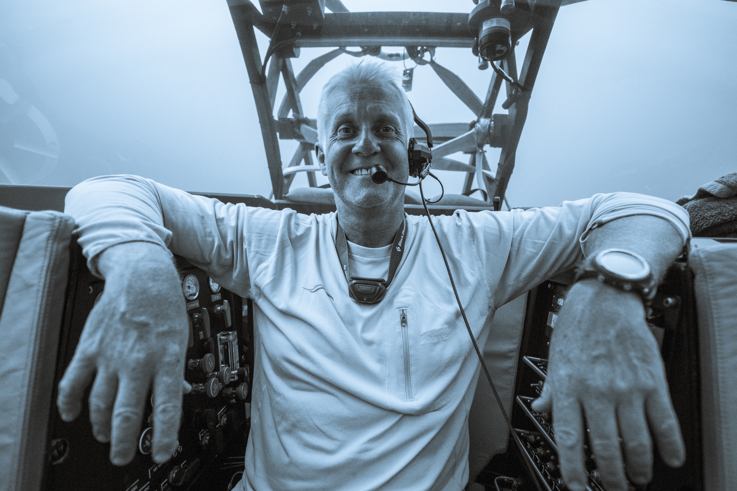 Submarine team leader Alan Scott takes a break from the controls after hours in the deep ocean exploring the steep underwater slopes surrounding Saint Peter and Saint Paul Archipelago. Photograph by Novus Select