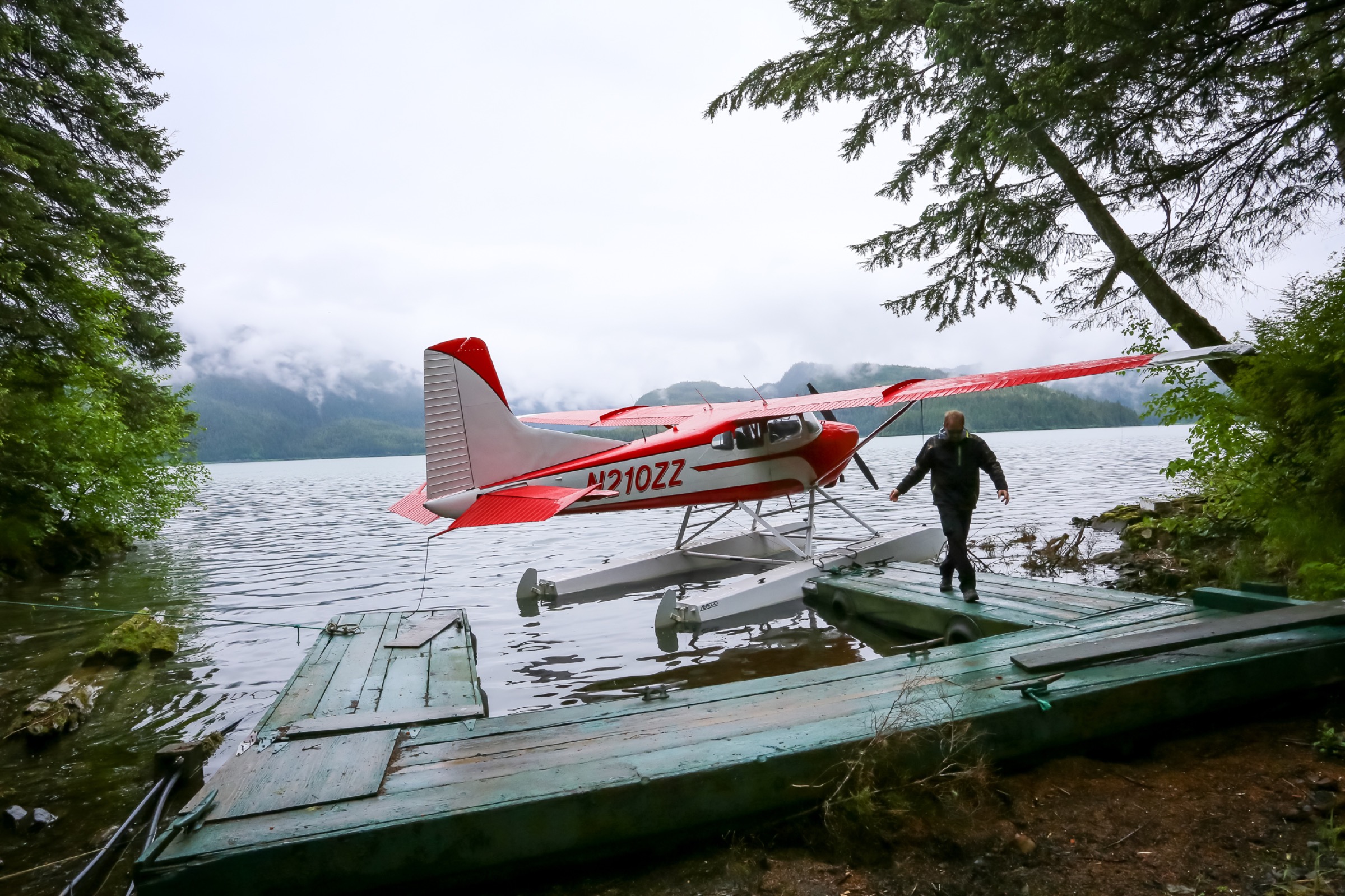 In Eyak Lake, pilot Mike Collins readies his float plane for a flight. Photograph by Julia Rosen