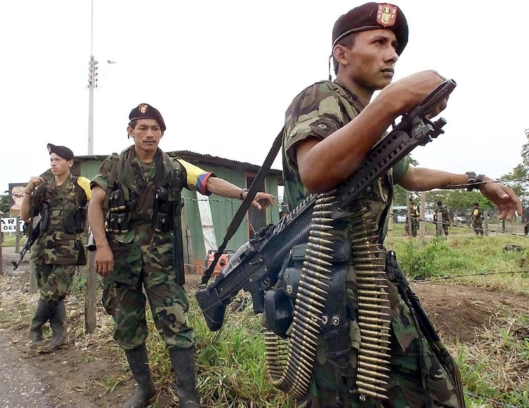 FARC guerrillas stand guard during talks between the rebel chief and the Colombian president in 2001. Photograph by LUIS ACOSTA / AFP via Getty Images