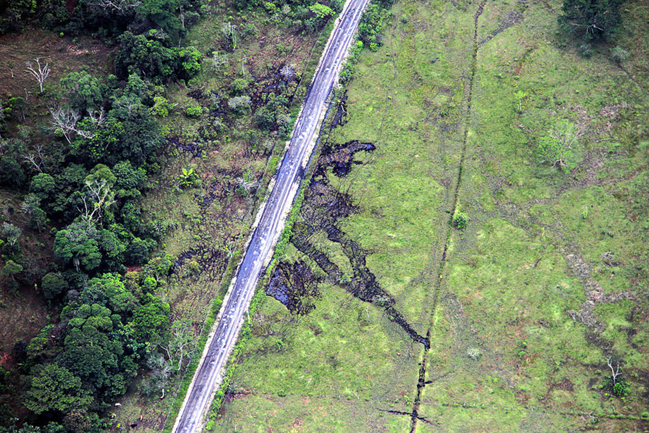 In a 2014 attack, the FARC intercepted a convoy of 19 oil trucks and forced the drivers to dump four thousand barrels of crude oil in the road. Photograph by César Mariño García / Pacific Press / LightRocket via Getty Images