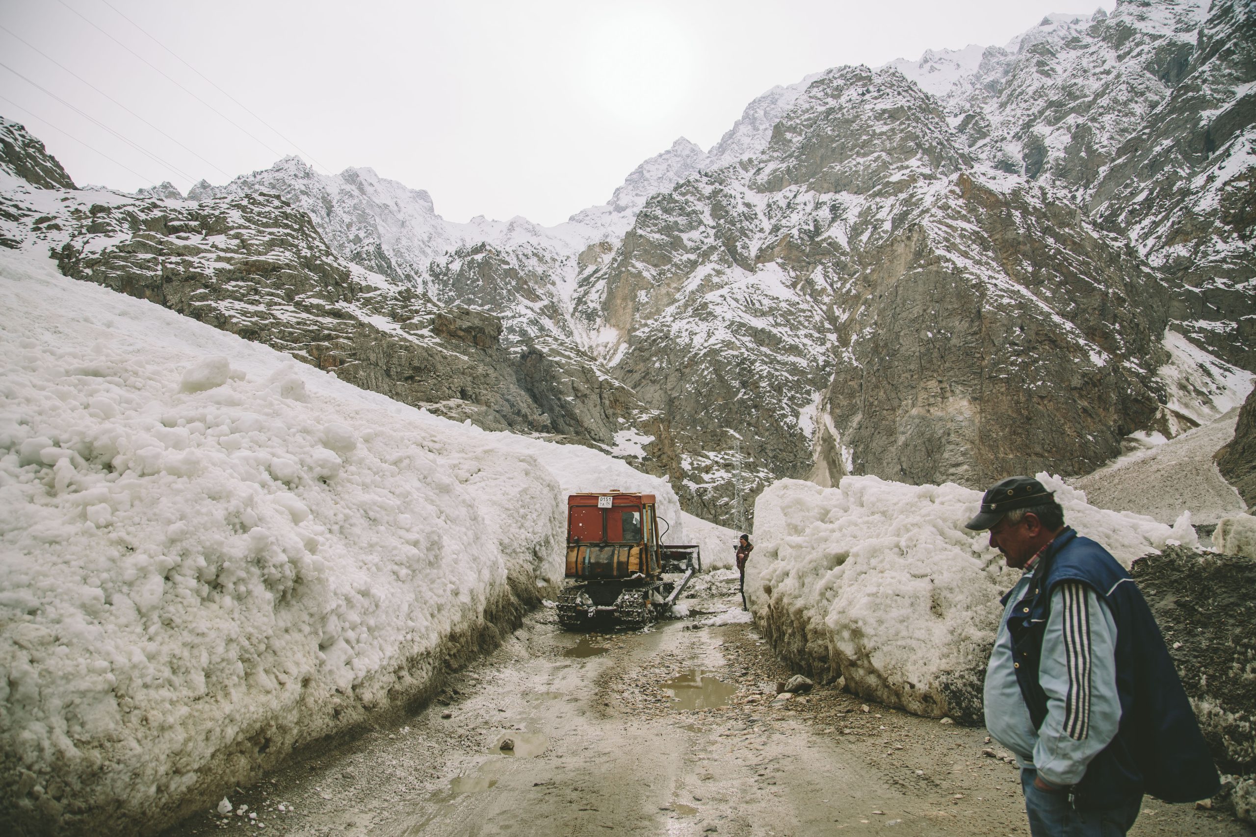 Slow going on the Pamir Highway. In several places, where heavy debris had completely obliterated the road, Tanya Rosen coaxed the Land Cruiser through a slot the width of a single bulldozer. Photograph by Joel Caldwell