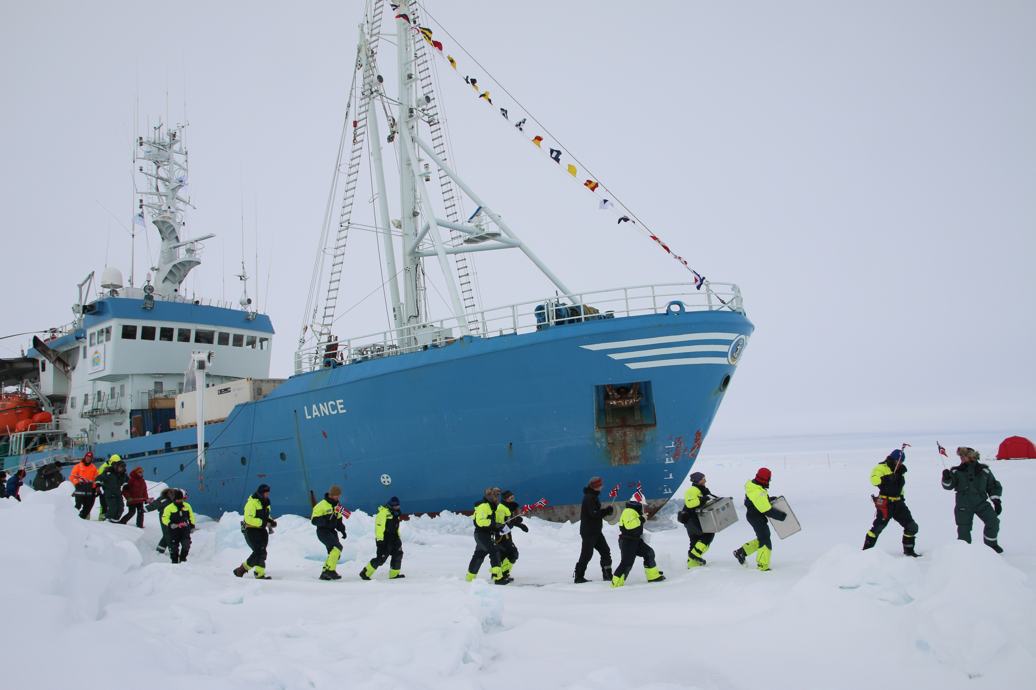 To study Arctic sea ice over the course of its life cycle, the crew of the R/V Lance froze the vessel into a kilometer-wide ice floe in January, and floated with it until the floe broke up in June. Photograph by Mats Granskog, Norwegian Polar Institute