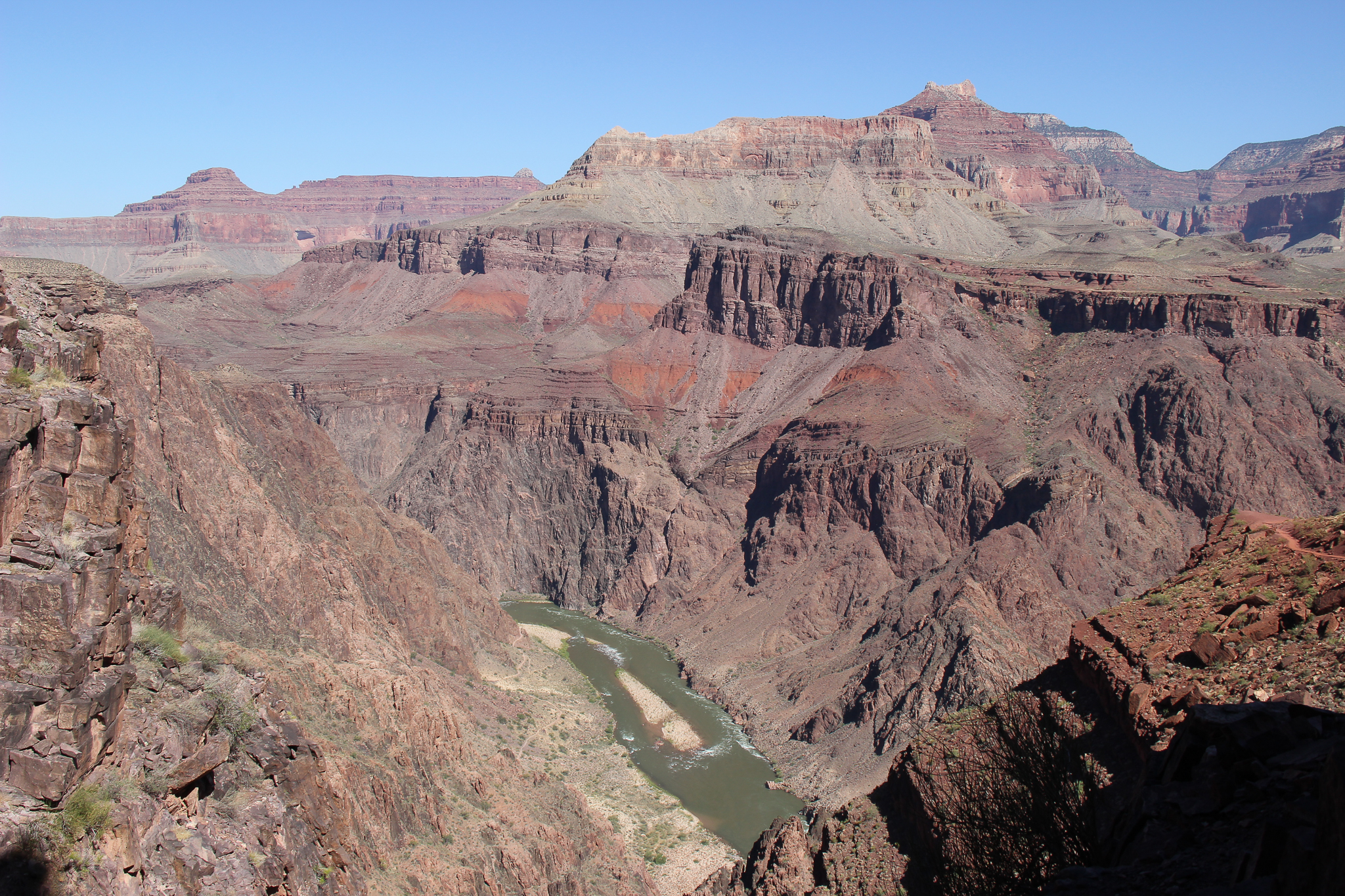 The Colorado River lies far below this outlook along the South Kaibab Trail—a seven-mile descent into the Grand Canyon.