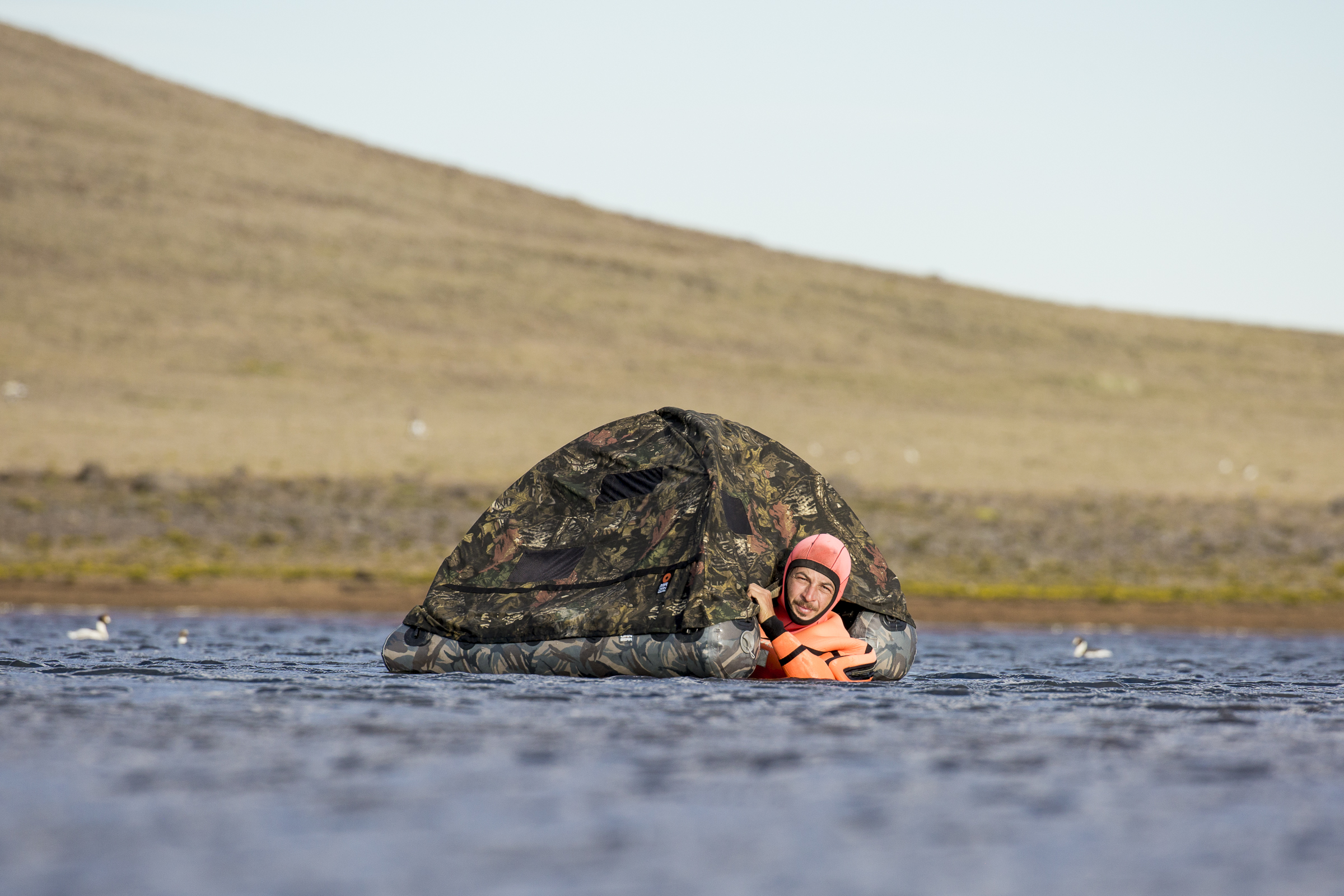 Ecologist and photographer Ugo Mellone frequently donned a dry suit and entered a floating blind to capture the imagery in this story.