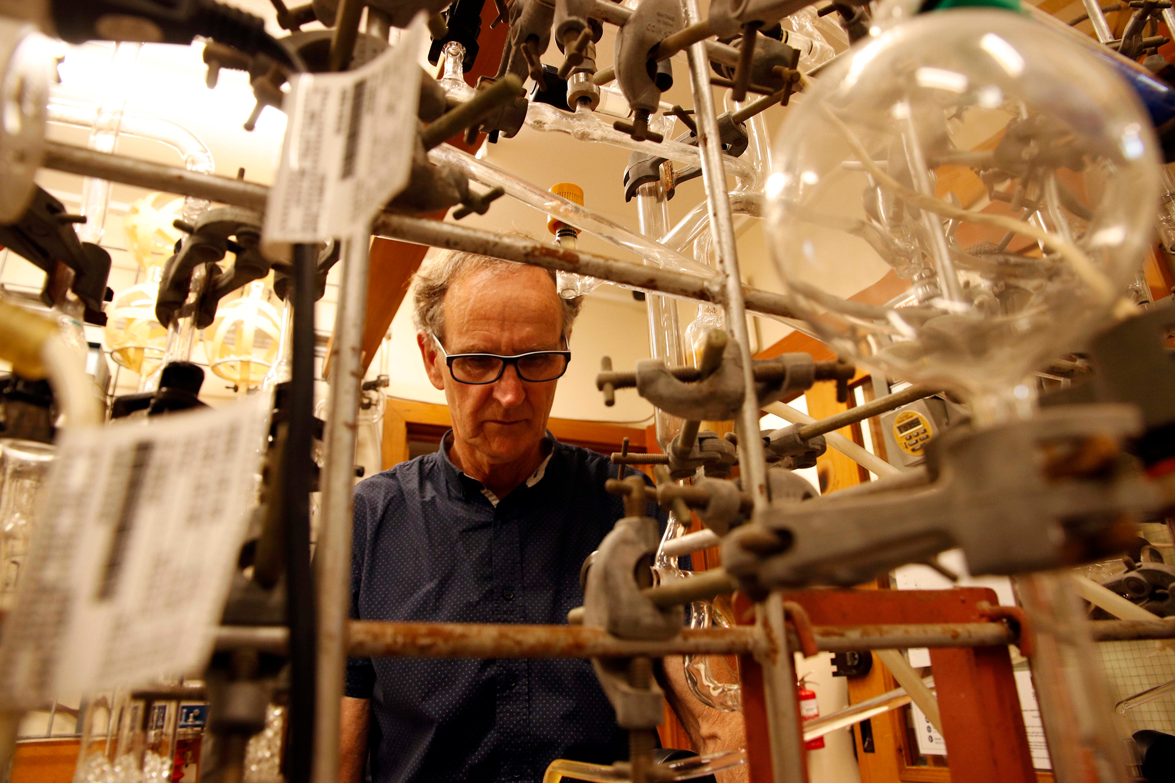 Radiocarbon expert Alan Hogg turns wood into dates at his University of Waikato lab in Hamilton, New Zealand. Photograph by Kate Evans.