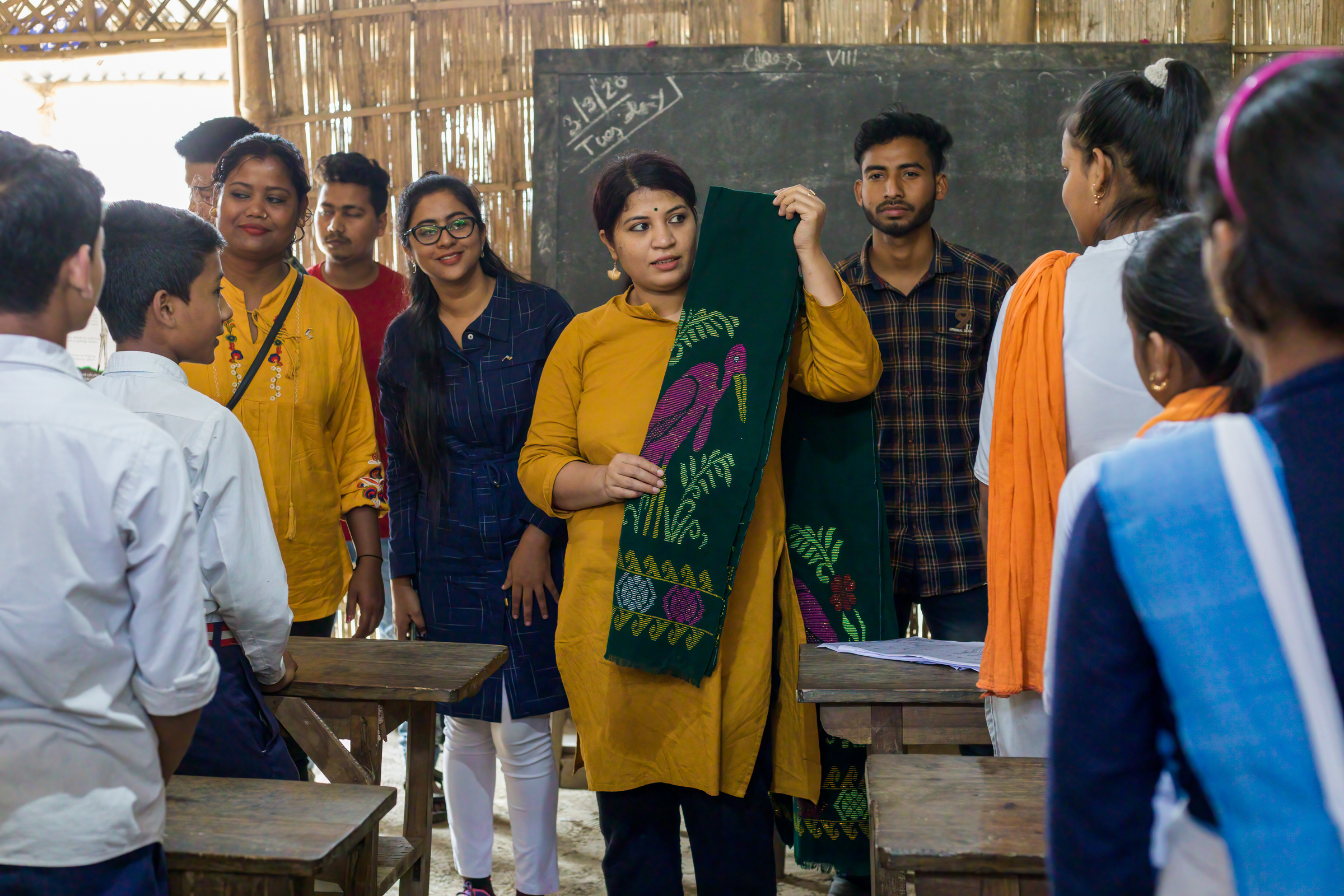 During school visits, students refer to Purnima Barman as “Hargila Baideo,” which translates to “elder sister of greater adjutants.”
