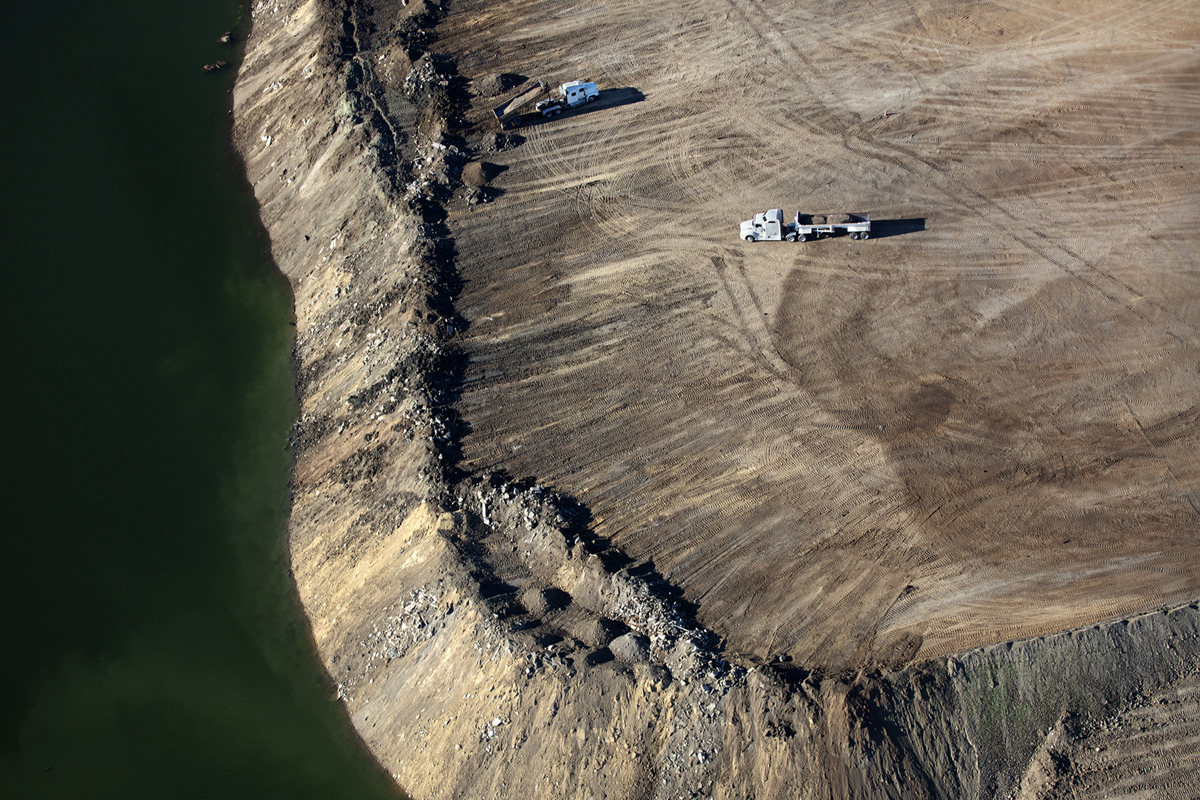 Trucks transport dirt and sediment to rebuild the South Bay’s wetlands.