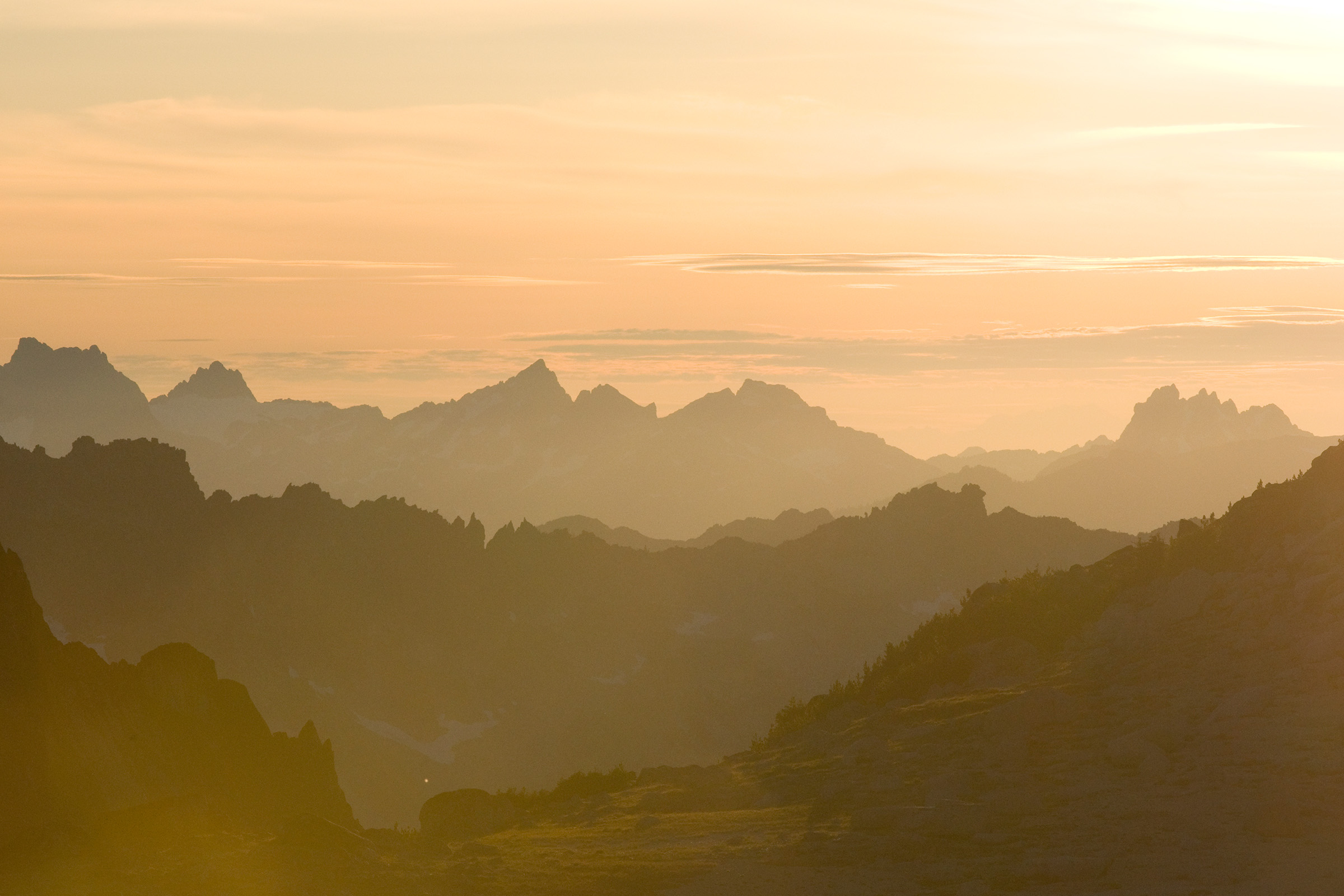 Silhouetted view of the Alpine Lakes Wilderness Area, a known wolf-inhabited region in Washington’s Okanogan-Wenatchee National Forest. Photograph by Steven Kazlowski