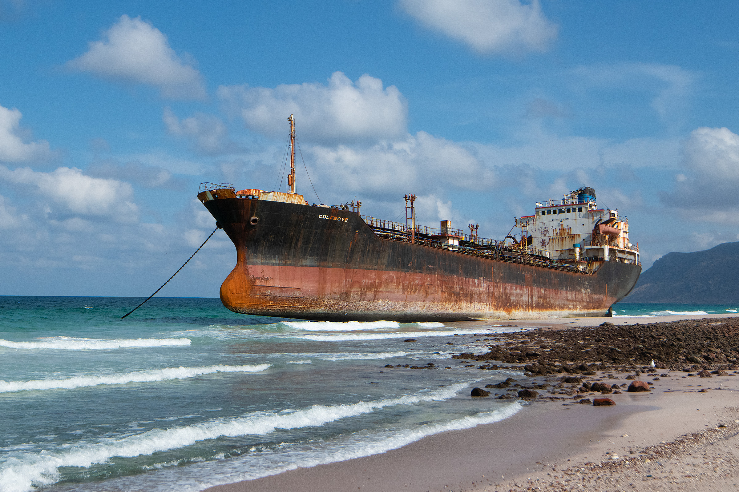 A large ship, wrecked from a cyclone that struck the region in 2015, anchored along Socotra’s coast.