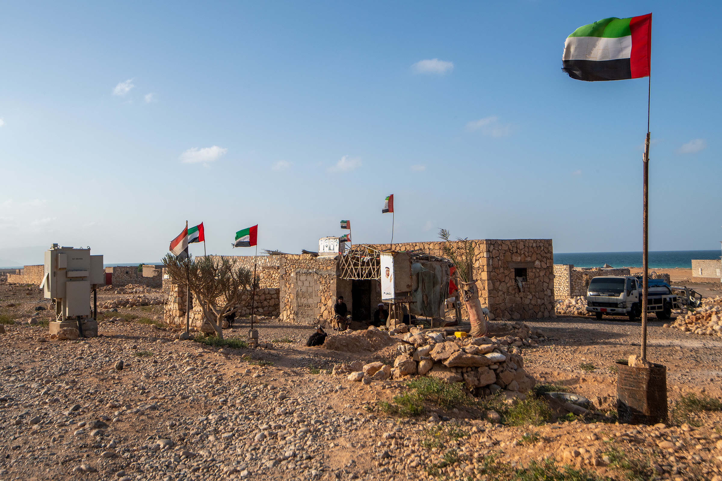 A small town in Socotra bearing the flag of the United Arab Emirates, a country that has had an increasing influence on the island.