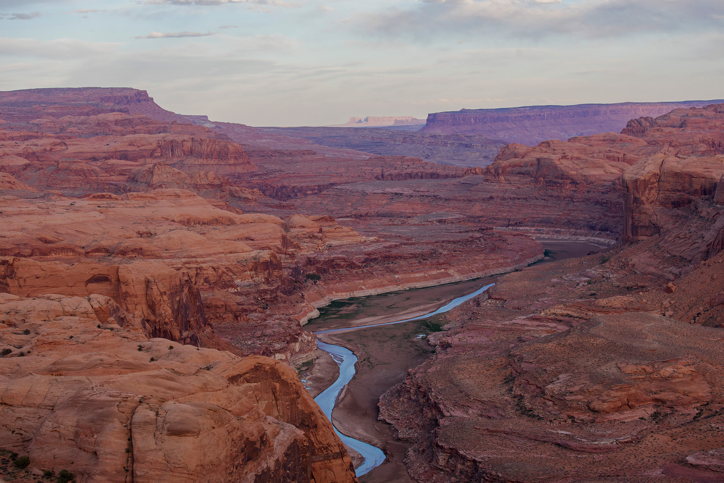 The San Juan River pushes through a thick layer of soft sediment, remnants of the former lake bed. At full pool, a river would have been totally indiscernible from this vantage point, and houseboats not an uncommon sight.