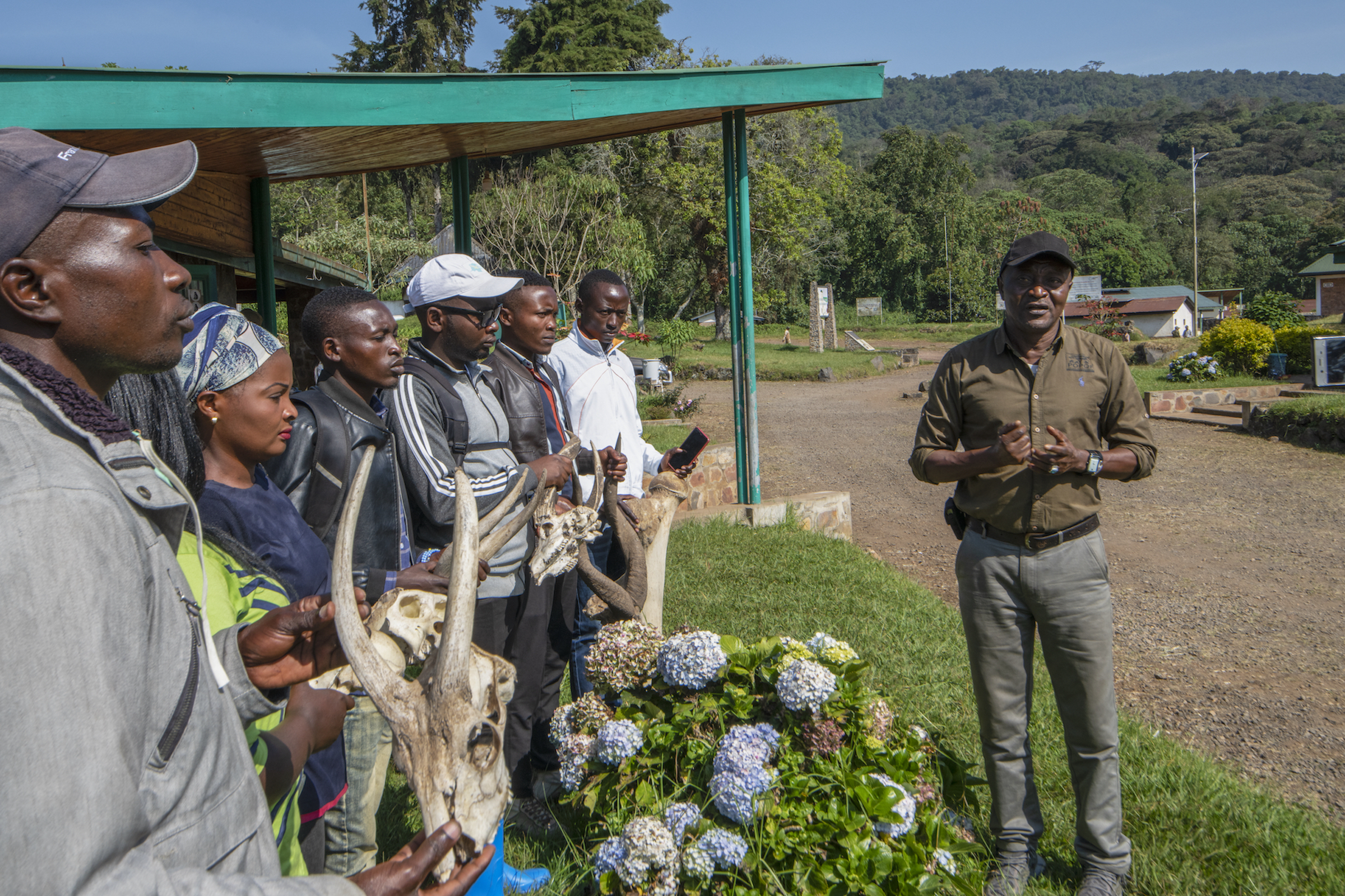 As part of his community tourism project, John Kahekwa brings both tourists and local people who live near Kahuzi-Biega National Park to see eastern lowland gorillas and learn about their struggles to survive. Photograph by Jess Craig