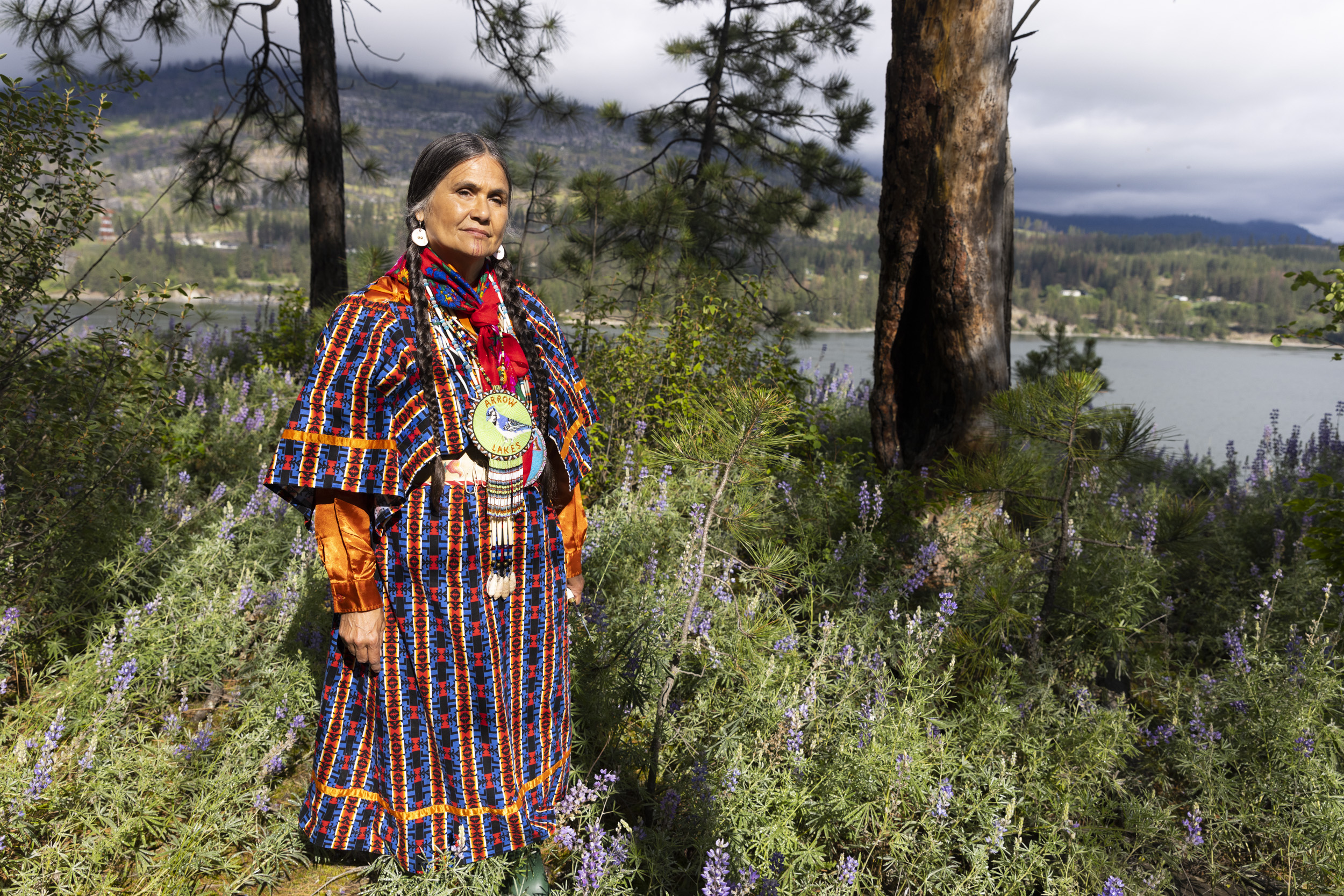 Shelly Boyd, cultural leader for the Lakes Band, also know as the Sinixt, of the Colville Confederated Tribes stands at the location of Kettle Falls, a traditionally vital fishing location, which was drowned by the Grand Coulee Dam.
