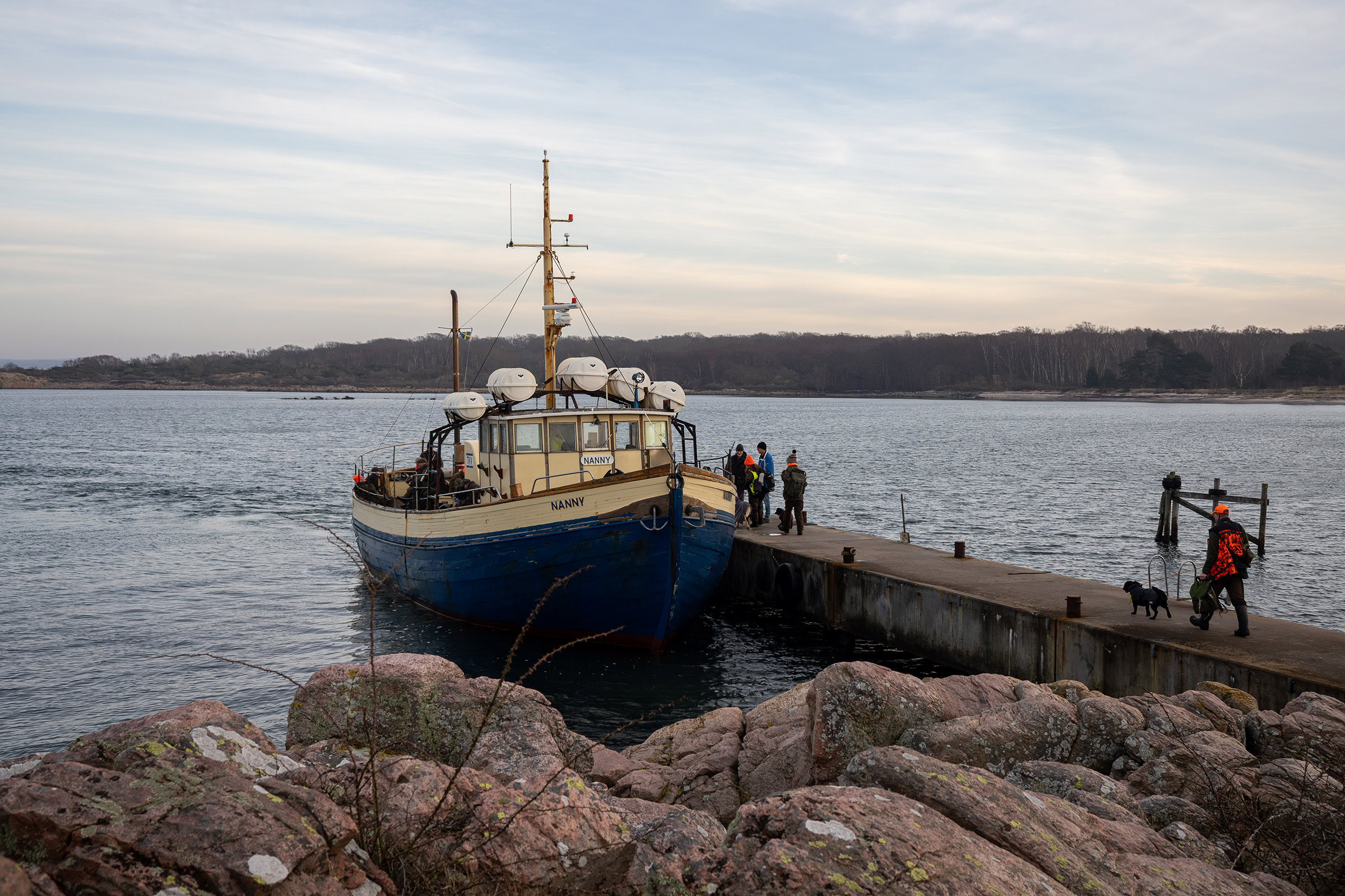 A wooden boat called the Nanny docked at a pier on Hallands Väderö